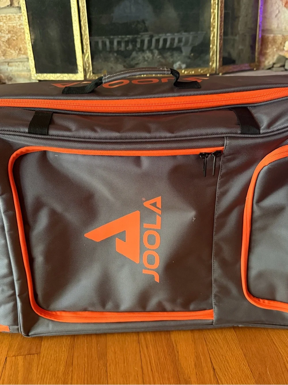 JOOLA Gray Backpack with Orange Accents